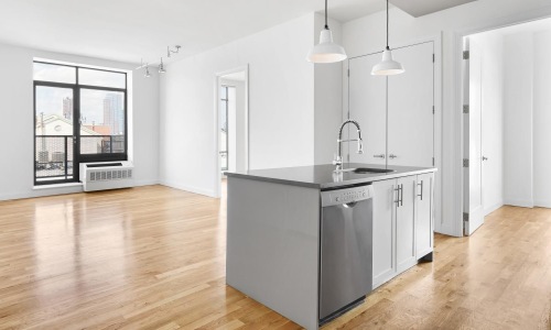 Wide open living areas perfect for entertaining a kitchen with white walls