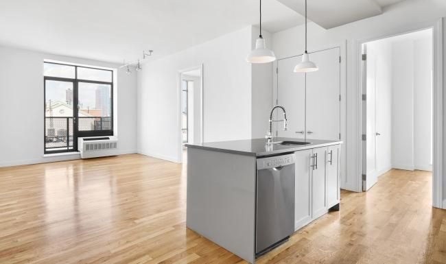 a kitchen with white walls