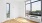 a room with windows and a wood floor